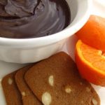 Rich and Dark Chocolate Ganache with Cookies and Clementine