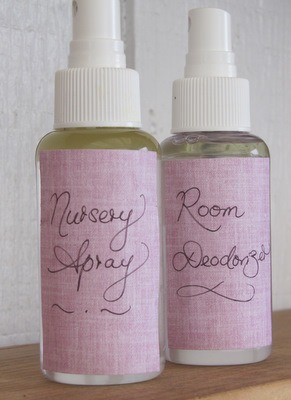 Image of two spray bottles. Purple handwritten labels say, "Nursery Spray" and "Room Spray".