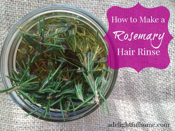 A bird's eye view of a jar filled with rosemary vinegar. Text overlay says, "How to Make Rosemary Hair Rinse".