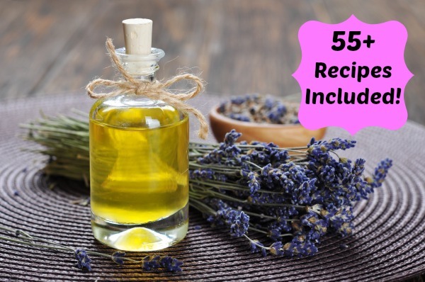 essential lavender oil with fresh flowers on wooden background. selective focus