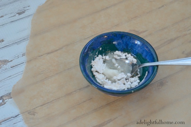 mixing arrowroot and oil for body butter